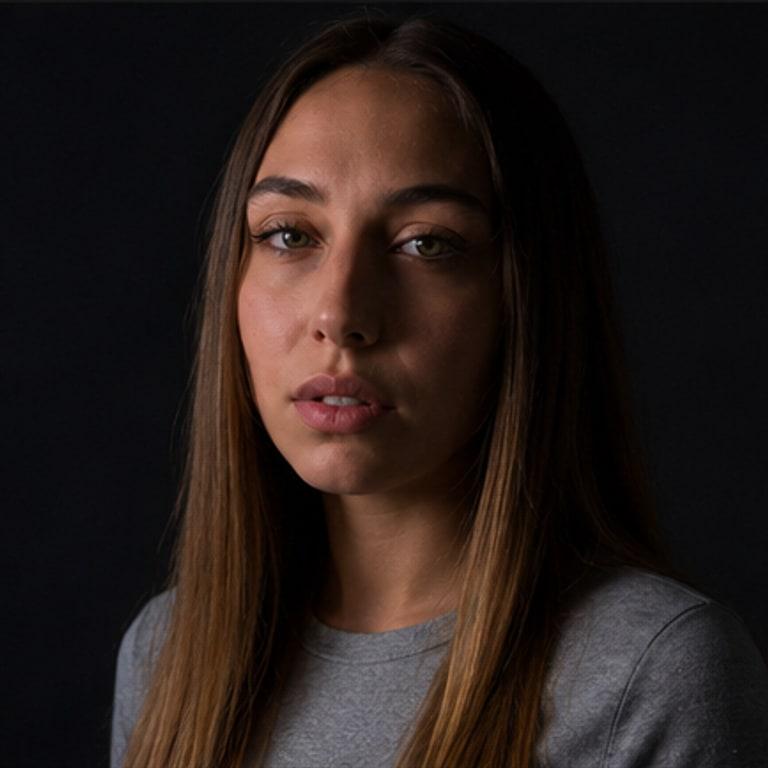 Synthetic identity, frontal view in low-key light